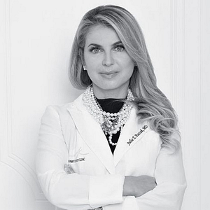 Russak Dermatology Clinic - Logo