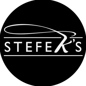 Stefek's Auctioneers & Appraisers - Logo
